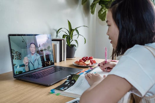 student studying with healthy snacks nearby