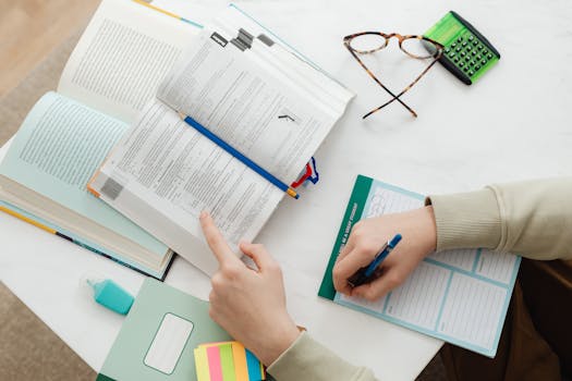 image of a student studying with a textbook