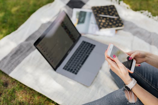 student relaxing outdoors